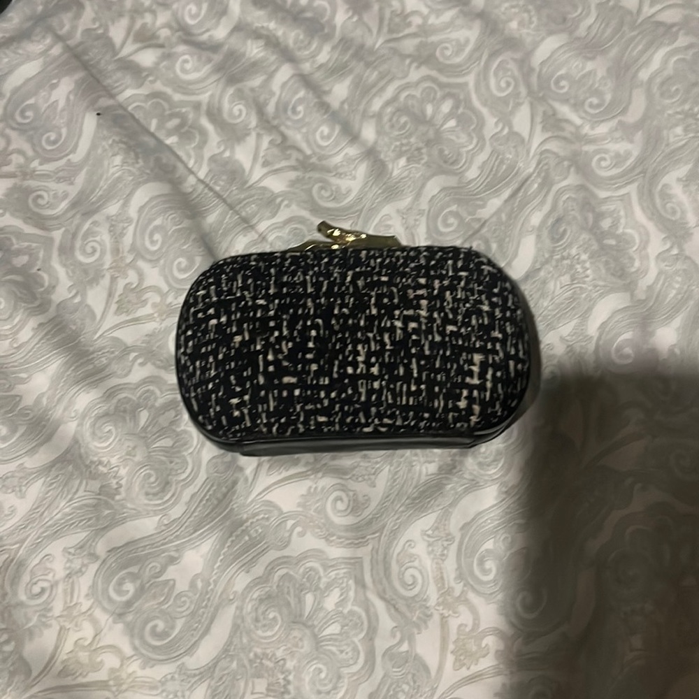 Diane von Fürstenberg black and white clutch.